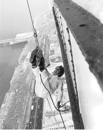 Esacpologist Karl Bartoni at the end of his first escape hanging from the top of The Blackpool Tower in 1983.